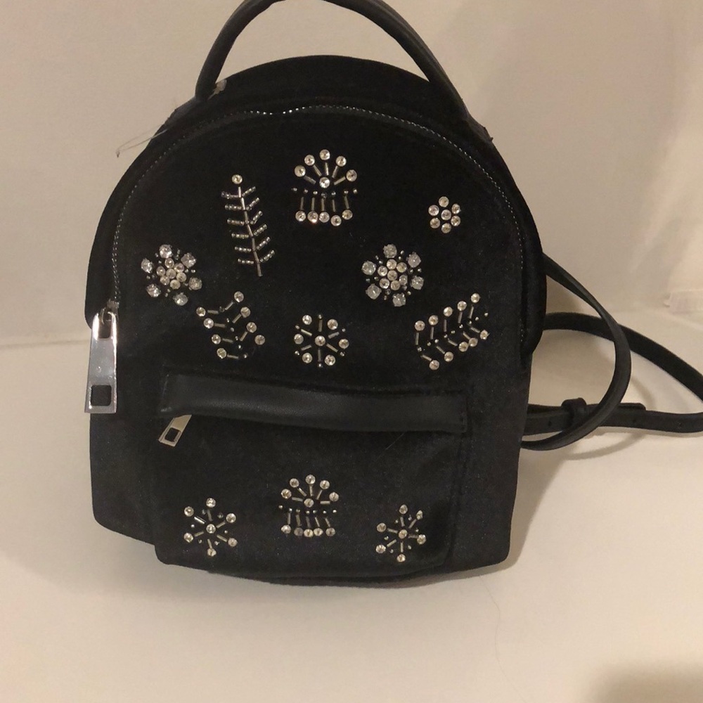 Brand new NEVER USED! Mini book bag